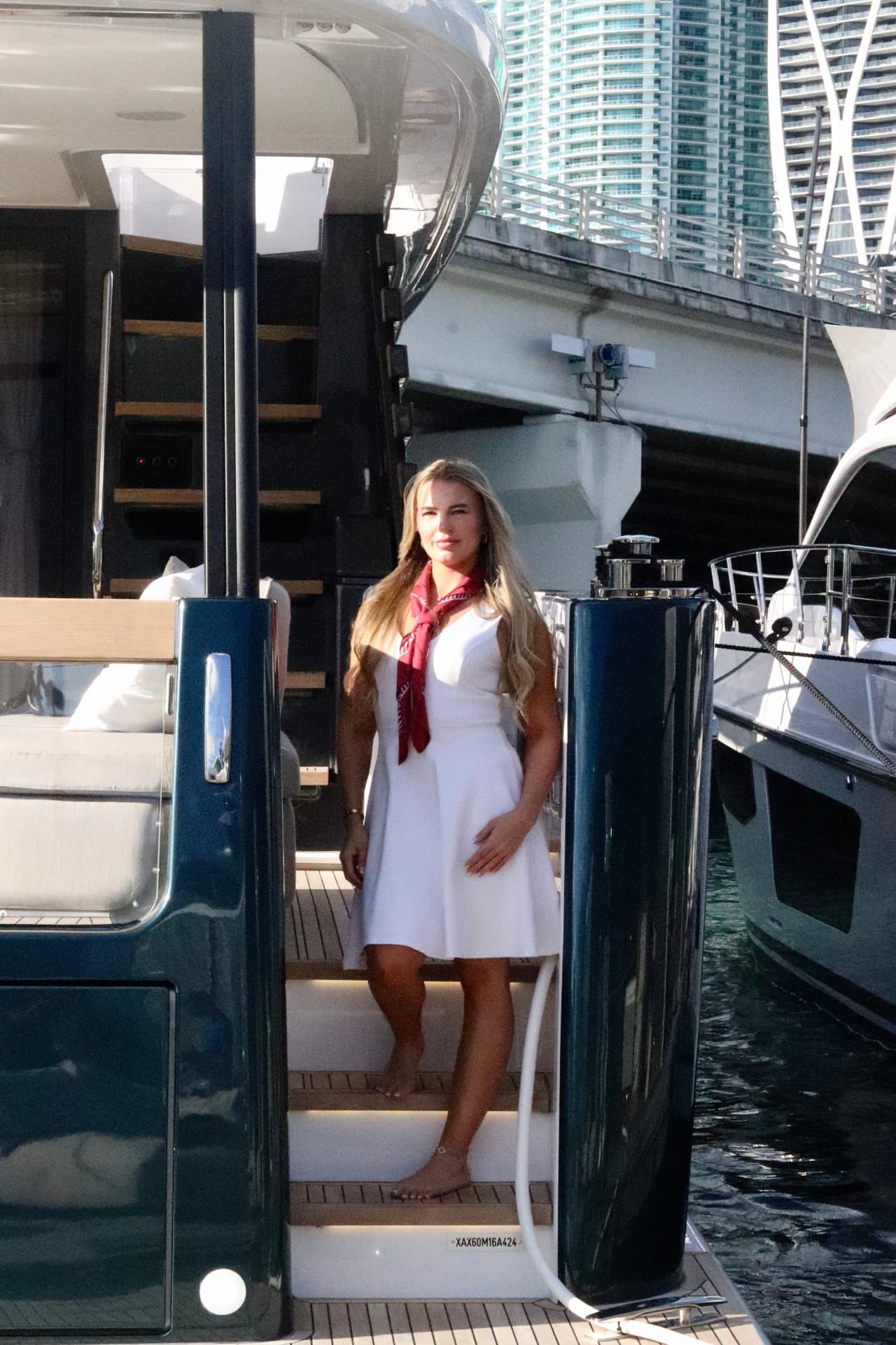 Crew member on the passerelle of a superyacht