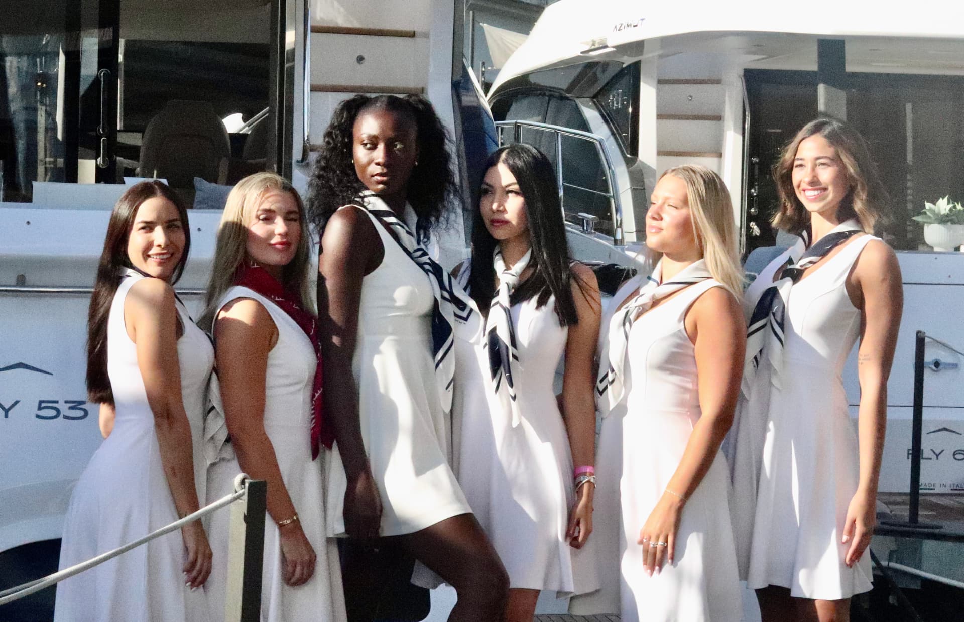 BOATique Staffing crew team dockside at a boat show